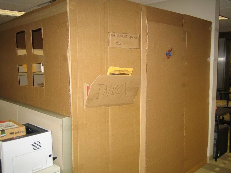 office prank - cardboard boxes over office