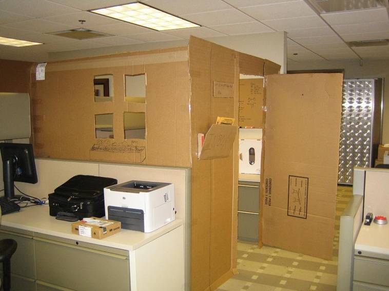 office prank - cardboard box office with windows